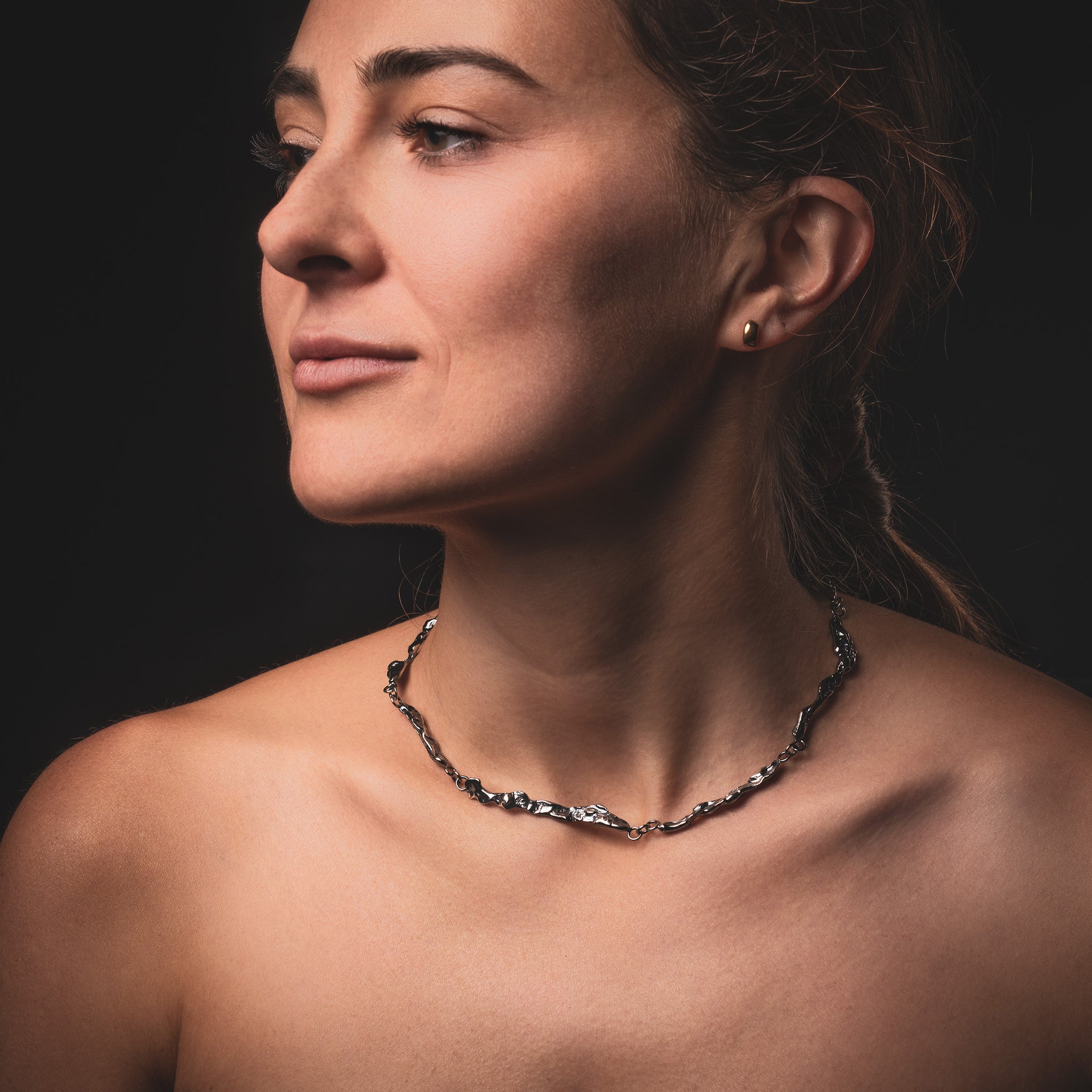 Young Woman Wearing Handmade Silver Necklace Choker 